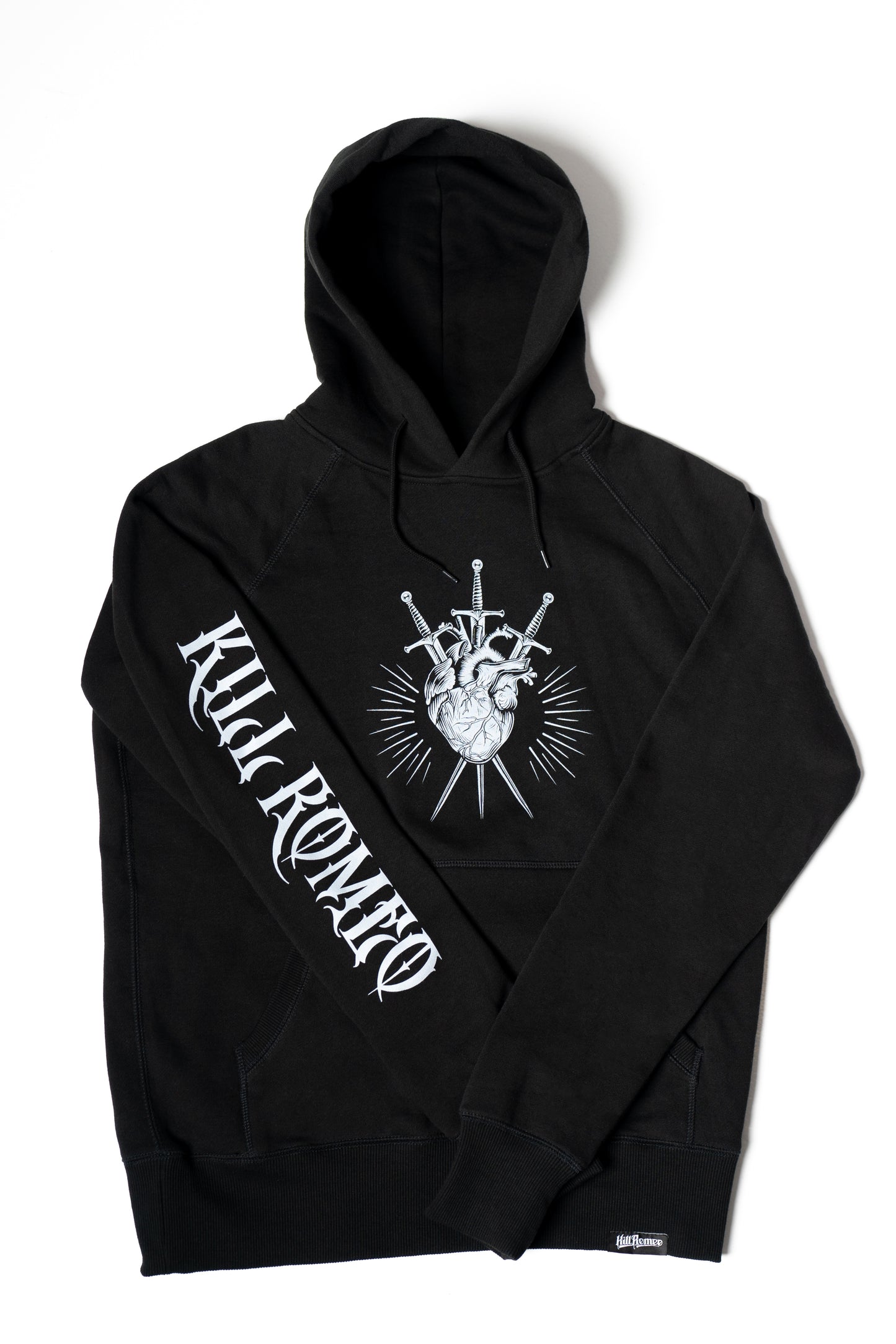 Black hoodie with screen printed pierced heart design in the front and kill Romeo lettering on the right sleeve.